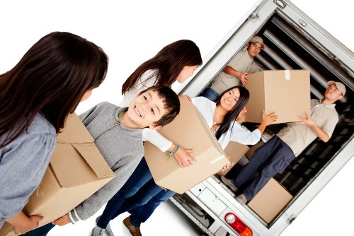 Professional team handling furniture pick-up in Storage Chiswick